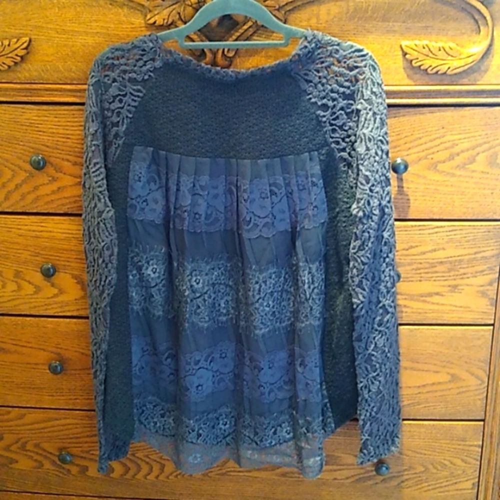 Beautiful long sleeve blouse in shades of grey and lace details.